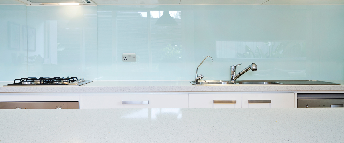 Painted Glass Splashback In A Modern Kitchen